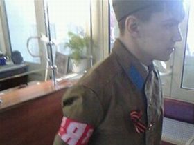 Молодогвардеец-полицай, фото Максима Новака, Каспаров.Ru Молодогвардеец-полицай, фото Максима Новака, Каспаров.Ru